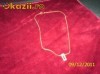 Pandantiv cu lantisor auriu AVON. .