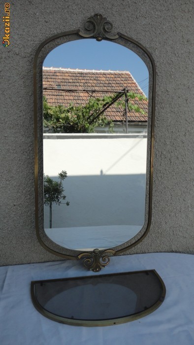 Oglinda pentru damne cu rama dn bronz si cu consola foto mare