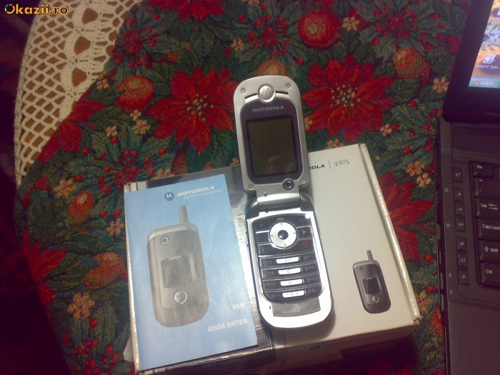 Telefon Motorola 975 3G foto mare